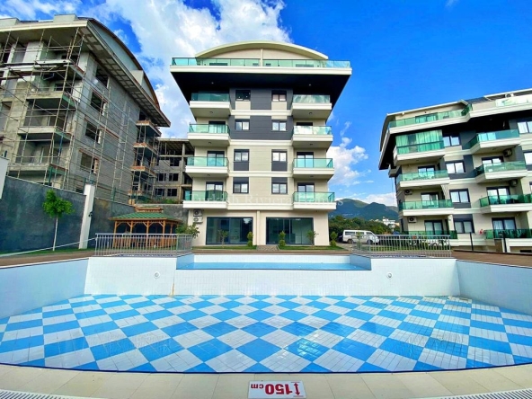 Новая квартира дуплекс 2+1 в жилом комплексе с двумя бассейнами (открытый и закрытый) в районе Оба,Алания