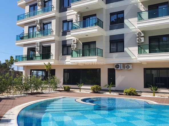 Полностью оборудованная мебелью и техникой квартира 1+1  в районе Оба, Алания